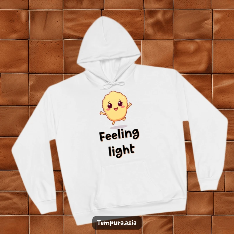 Funny tempura piece hoodie with cheerful eyes doing a playful hop, ideal for staying warm and amused.