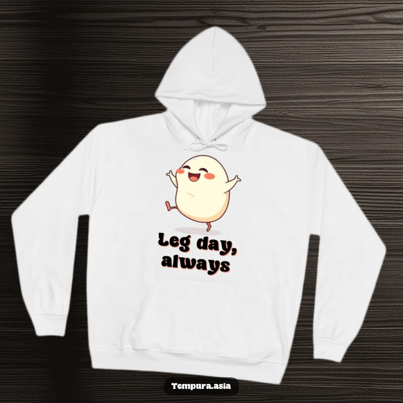 Funny gyoza hoodie featuring a grinning dumpling with tiny legs kicking with gusto, offering warmth and humor.