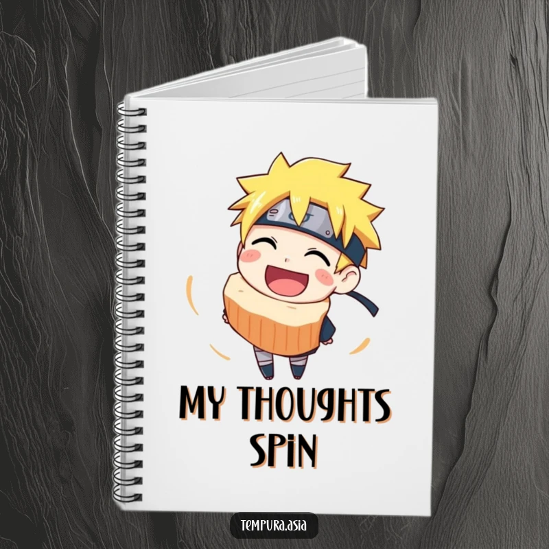 Funny narutomaki notebook with a grinning slice spinning around, ideal for journaling, note-taking, and creative tasks.